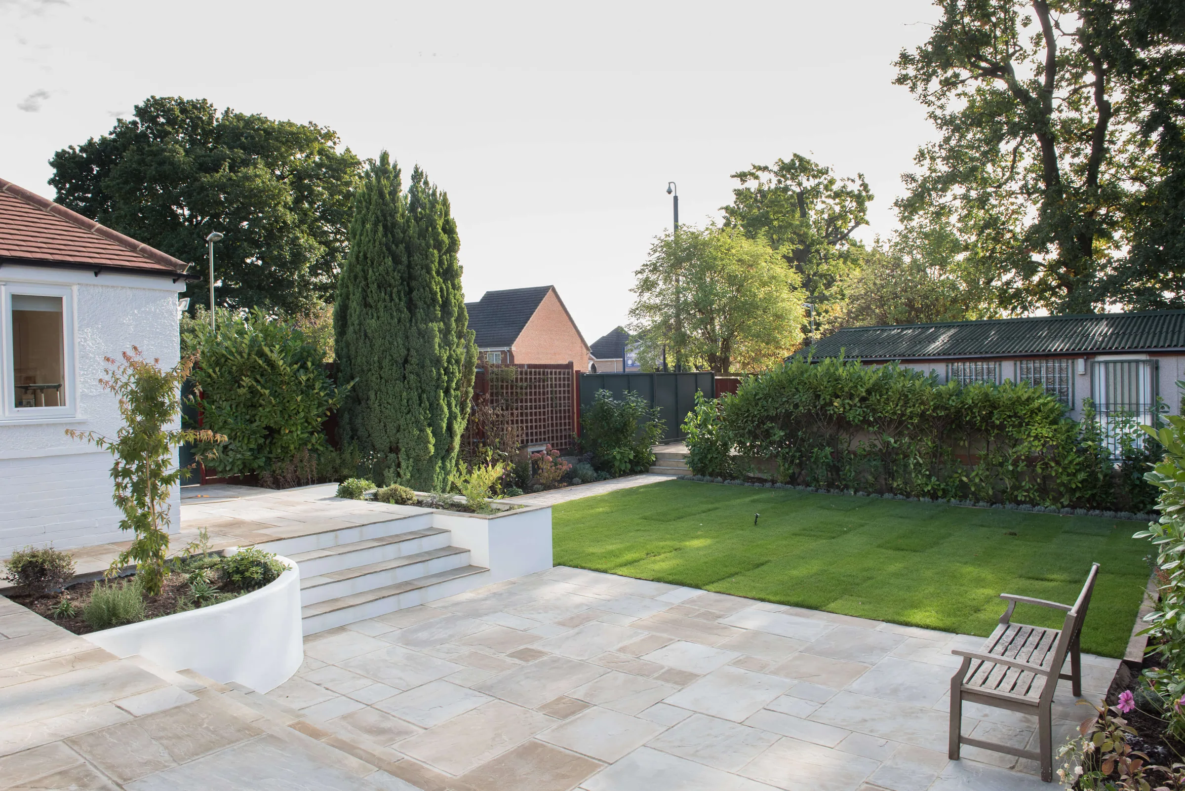 Rear extension and loft dormer at Arlington Road seen from the garden